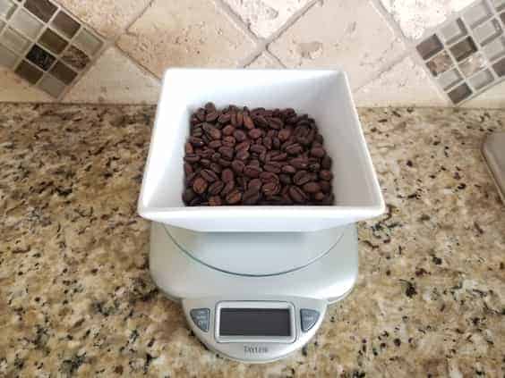 Coffee beans being weighed