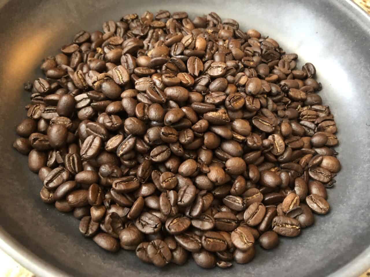 Bowl of medium roast coffee beans