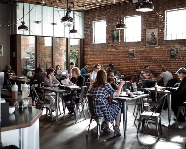 People in a café drinking coffee