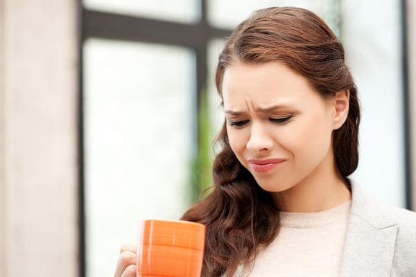 Women drinking bitter coffee